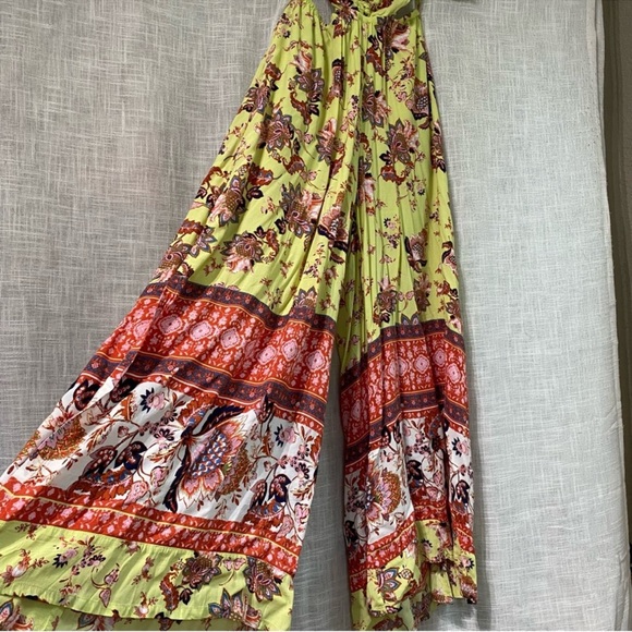 FREE PEOPLE Bali Citrus Skies Paisley Ruched
Halter Neck Flowy Jumpsuit - Picture 6 of 13